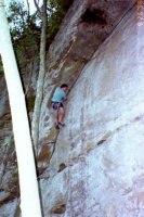 Steve Must following on the first ascent of "Peaceful Warrior", 5.10, at Pistol Ridge in Red River Gorge.  9/26/1998