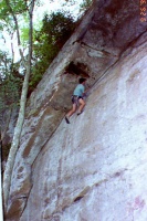 Steve Must following on the first ascent of "Peaceful Warrior", 5.10, at Pistol Ridge in Red River Gorge.  9/26/1998