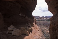022:  A view through a rock keyhole, looking up canyon at where we have just traveled from.