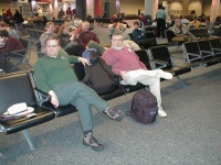 Bob, Roland (front), Bill, Katrina, Chuck, Nate, and Jeanie waiting in the airport. We did this a lot. 2/25/03