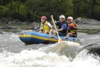 Beth, Ian, and Tim at the helm of B-Boat